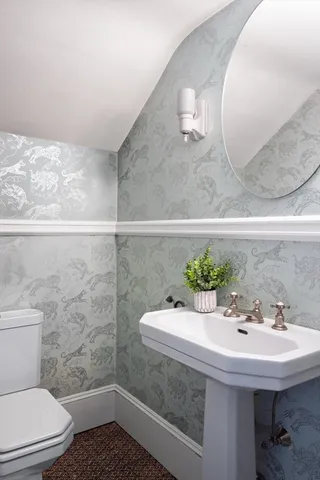 a bathroom with a sink and toilet