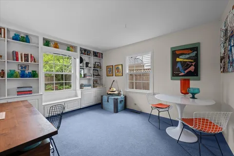 a room with furniture and a window