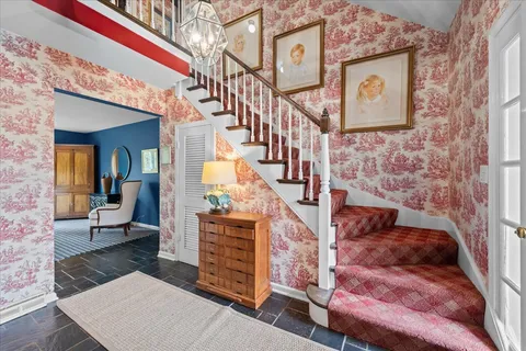 a view of entryway livingroom and hall