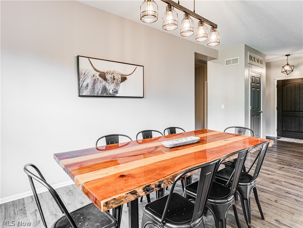 6573 Boneta Road Medina, OH 44256 - Photo 11 of 38 Dining area with hardwood / wood-style floors