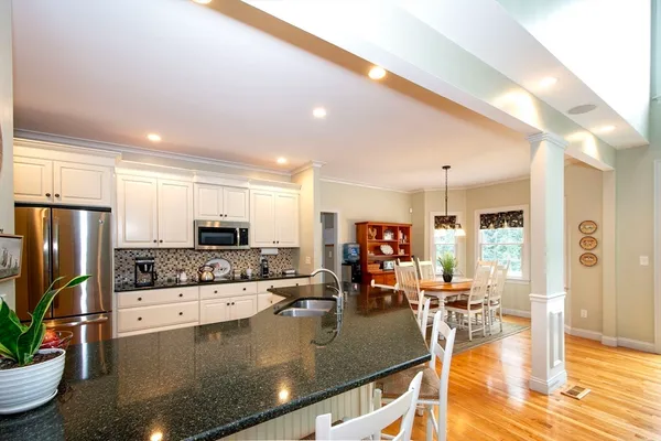 a view of a living room and dining room