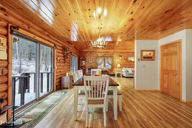 a view of a balcony with chairs
