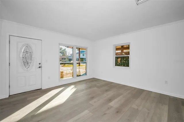 an empty room with windows