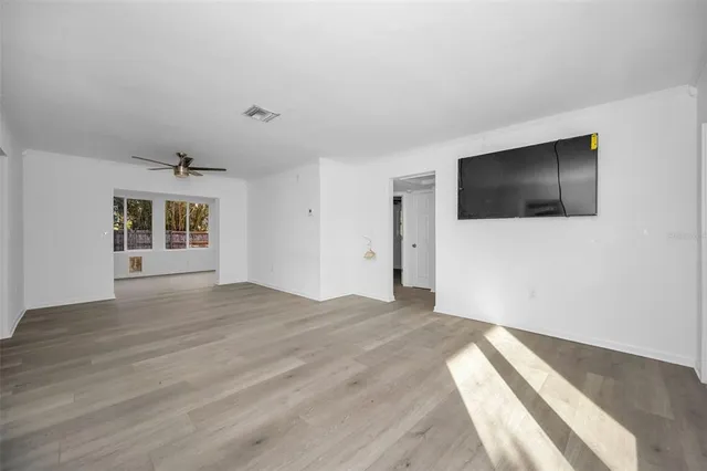 a view of a livingroom with a flat screen tv