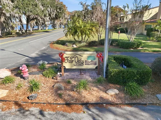 a sign board with parking space