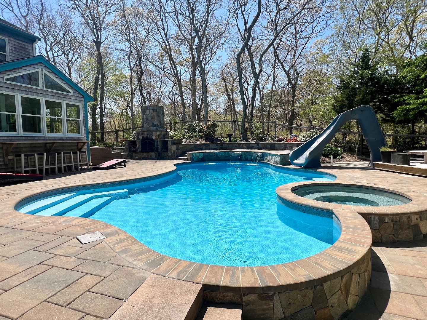 18 Cormorant Circle Edgartown, MA 02539 - Photo 1 of 42 a view of a swimming pool with a patio