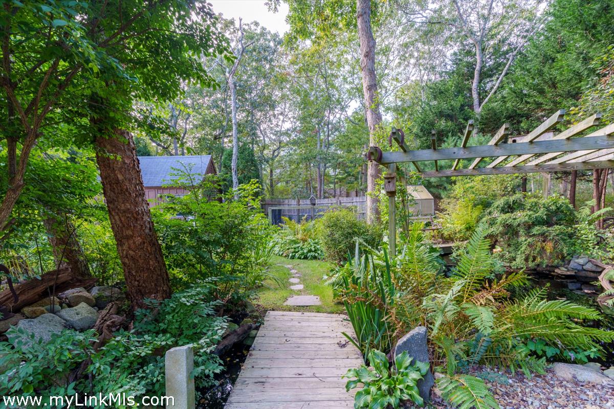 18 Cormorant Circle Edgartown, MA 02539 - Photo 30 of 42 a view of a pathway both side of yard