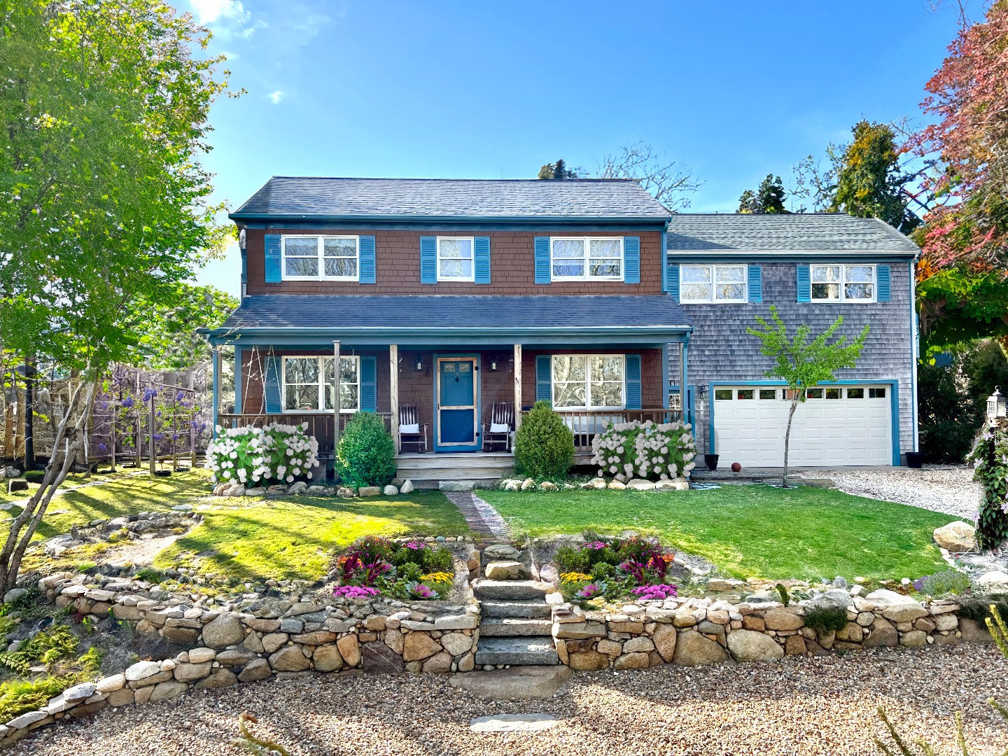 18 Cormorant Circle Edgartown, MA 02539 - Photo 3 of 42 a view of a brick house with a yard patio and swimming pool
