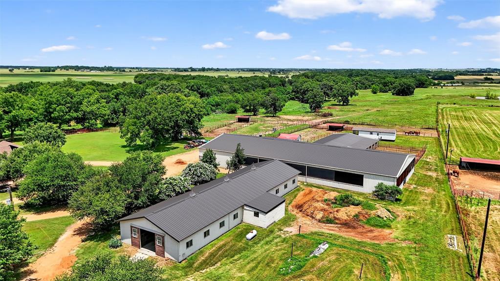 1717 1/2 Batey Road Collinsville, TX 76233 - Photo 1 of 39 aerial view of a house with big yard
