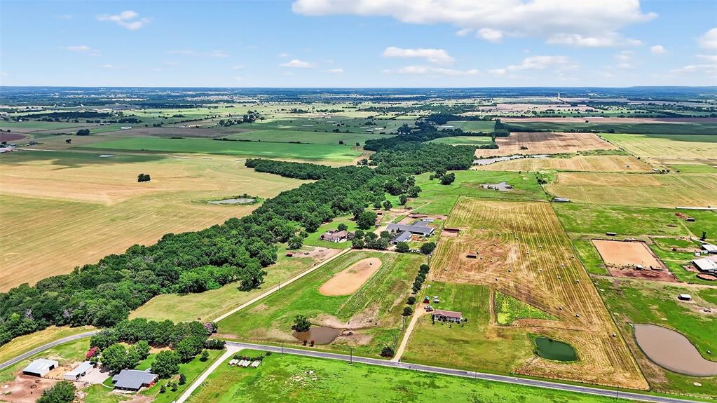 1717 1/2 Batey Road Collinsville, TX 76233 - Photo 40 of 40 a view of an ocean and beach
