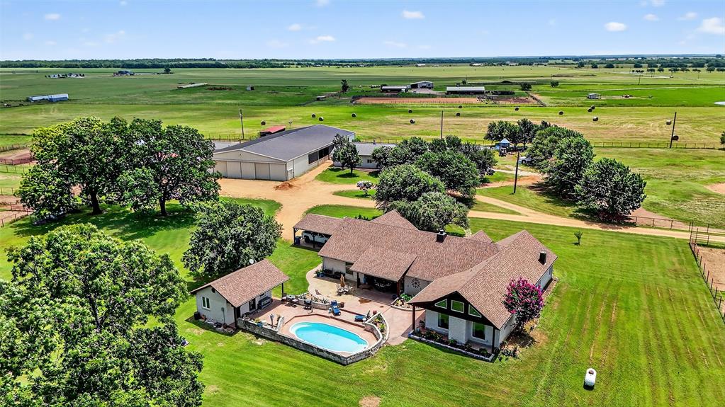 1717 1/2 Batey Road Collinsville, TX 76233 - Photo 7 of 40 an aerial view of ocean residential houses with outdoor space and swimming pool