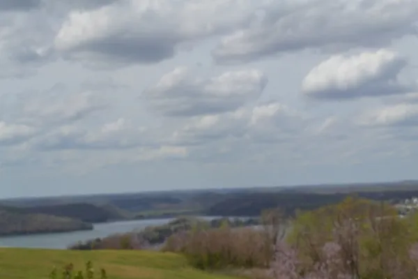 a view of lake and mountain