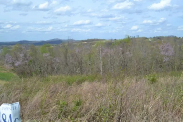 a view of mountain with lake view