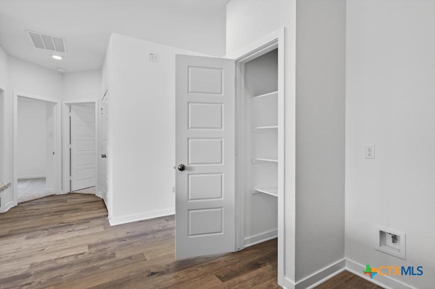 1915 Meridian Loop Temple, TX 76504 - Photo 12 of 29 a view of hallway with wooden floor