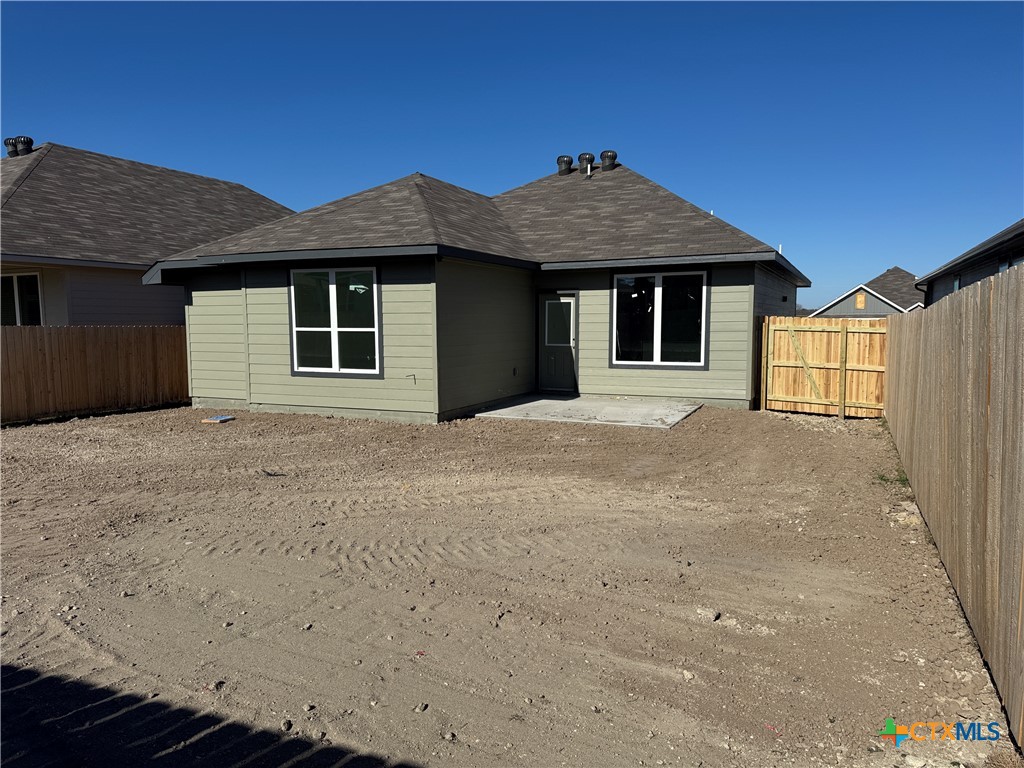 1915 Meridian Loop Temple, TX 76504 - Photo 12 of 13 a front view of a house with a yard and garage