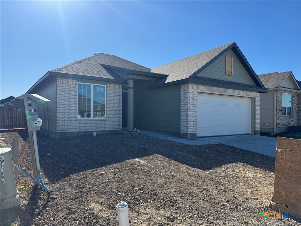 1915 Meridian Loop Temple, TX 76504 - Photo 2 of 13 a front view of a house with a yard