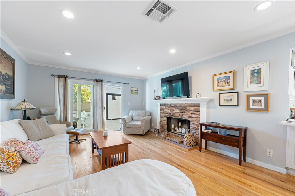 16762 Otsego Street Encino, CA 91436 - Photo 14 of 54 Main house family room and fireplace