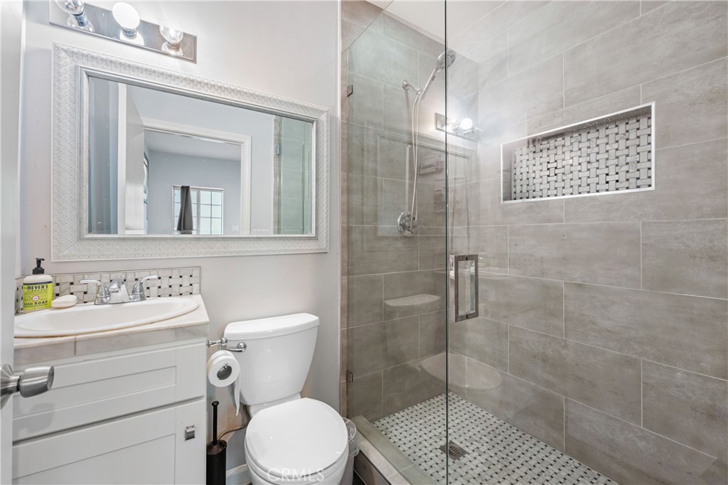 16762 Otsego Street Encino, CA 91436 - Photo 43 of 54 Downstairs ADU full bath, vanity, toilet & shower