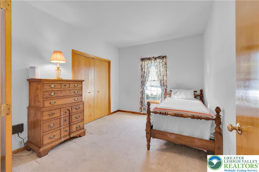 239 North 36th Street Allentown, PA 18104 - Photo 12 of 38 a bedroom with a bed and with furniture