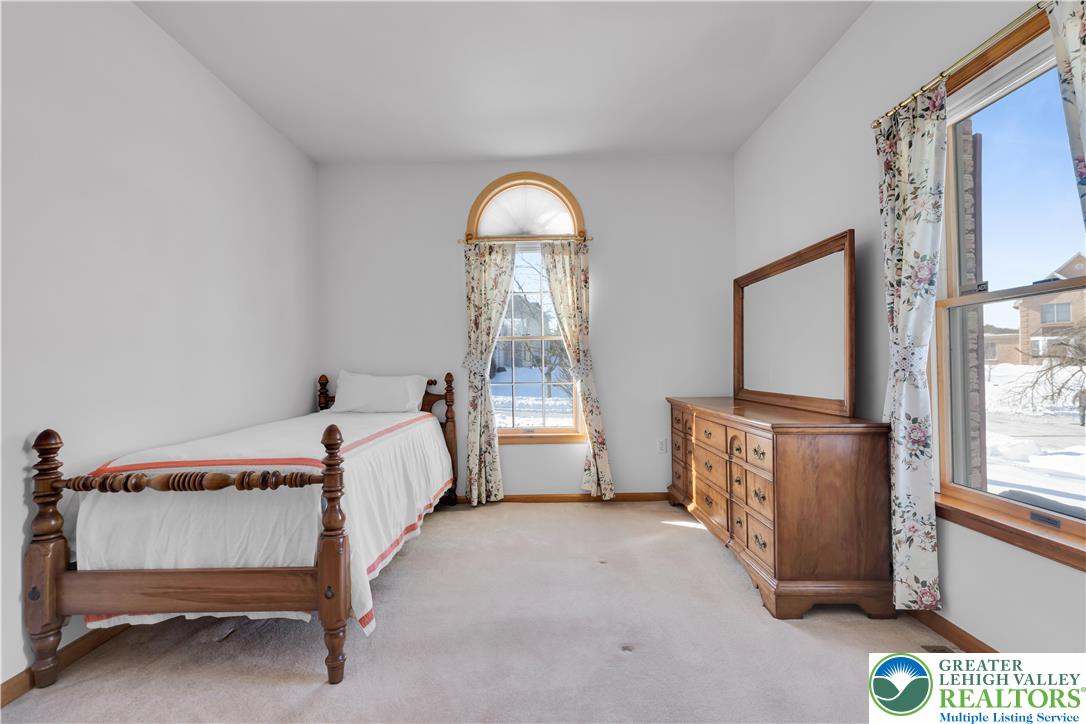 239 North 36th Street Allentown, PA 18104 - Photo 13 of 38 a bed room with a bed and a window