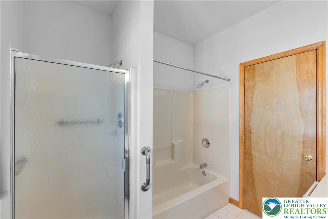 239 North 36th Street Allentown, PA 18104 - Photo 20 of 38 a bathroom with a bathtub and a shower