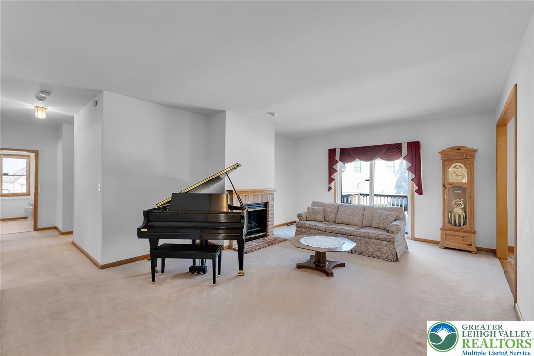 239 North 36th Street Allentown, PA 18104 - Photo 9 of 38 a living room with furniture and a piano