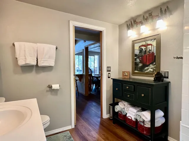 a bathroom with a sink vanity and a mirror