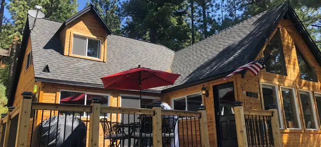 a front view of a house with glass windows
