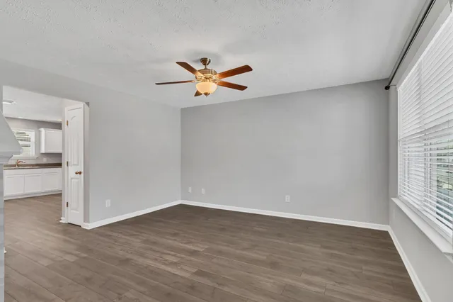 a view of swimming pool with outdoor seating