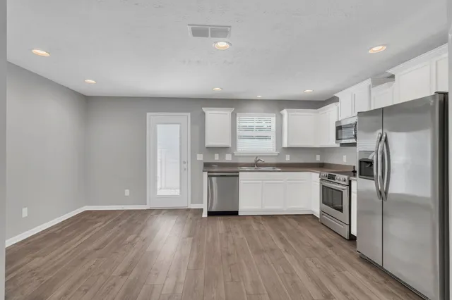 a view of a house with a garage