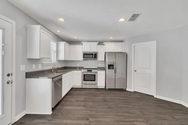 a view of a room with racks on the wall