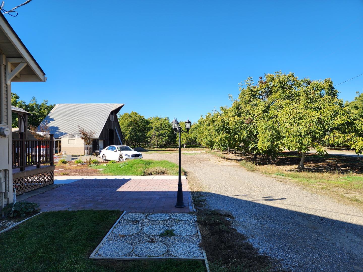 3719 North Hart Road Modesto, CA 95358 - Photo 31 of 47 a view of a house with swimming pool