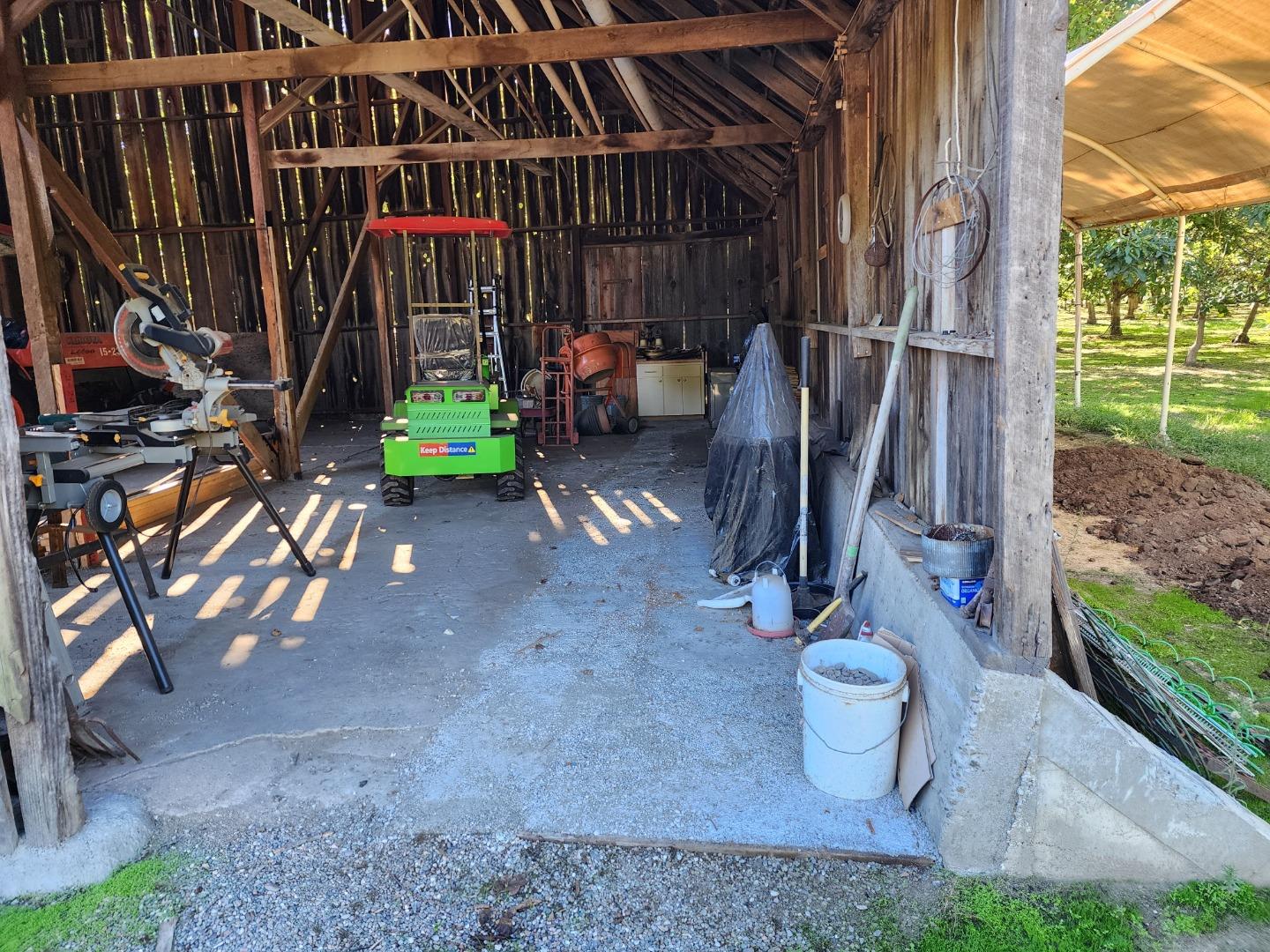 3719 North Hart Road Modesto, CA 95358 - Photo 46 of 47 a view of an empty room with wooden floor and outdoor seating