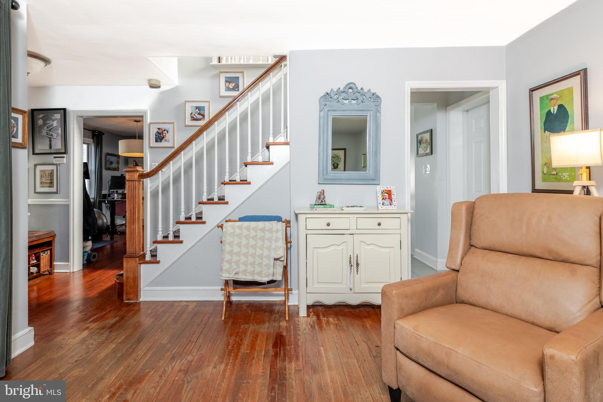 239 Hopkins Road Haddonfield, NJ 08033 - Photo 13 of 76 a living room with furniture and a wooden floor