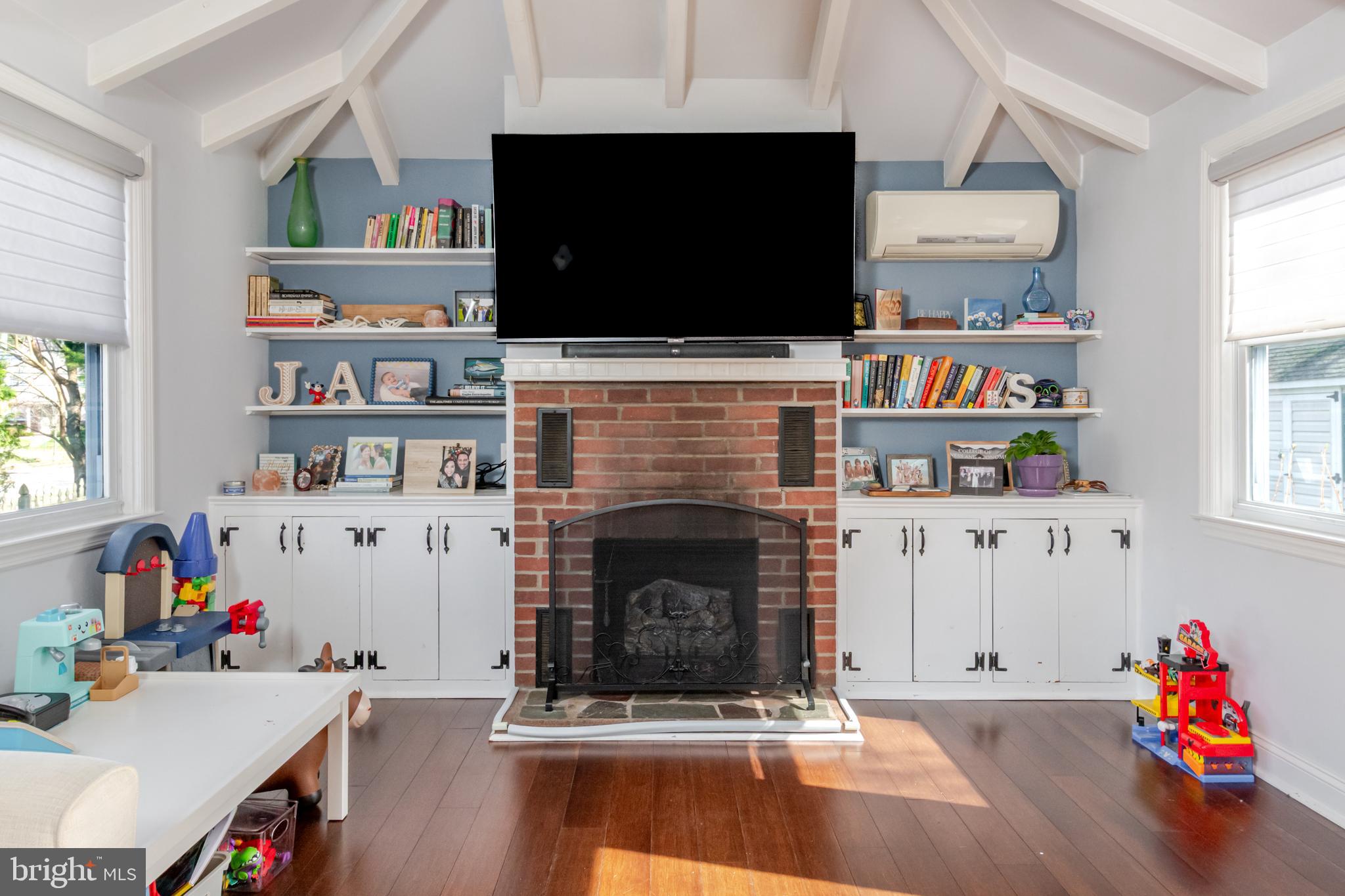 239 Hopkins Road Haddonfield, NJ 08033 - Photo 39 of 76 a living room with furniture and a fireplace