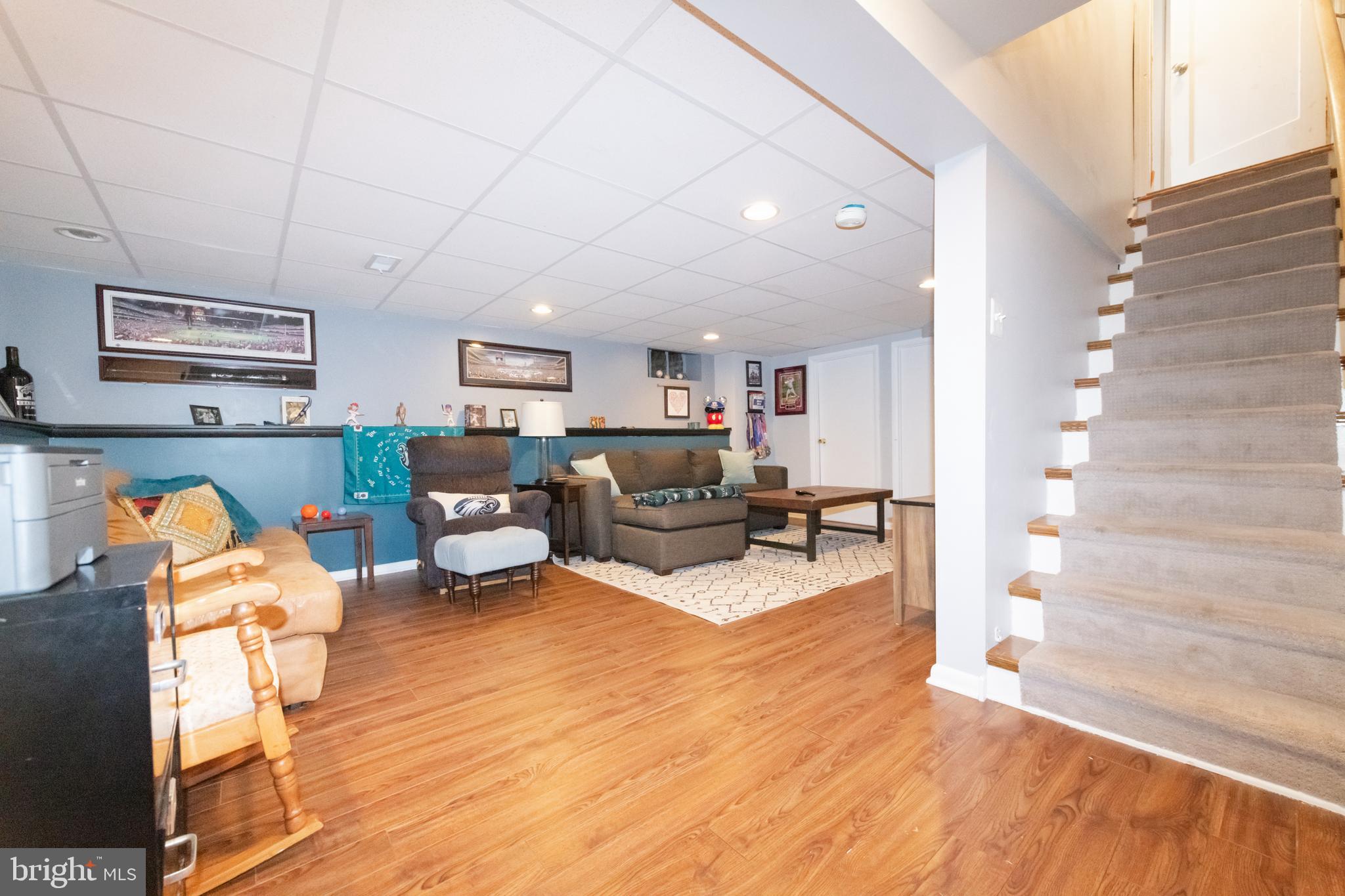 239 Hopkins Road Haddonfield, NJ 08033 - Photo 54 of 76 a living room with furniture and a wooden floor