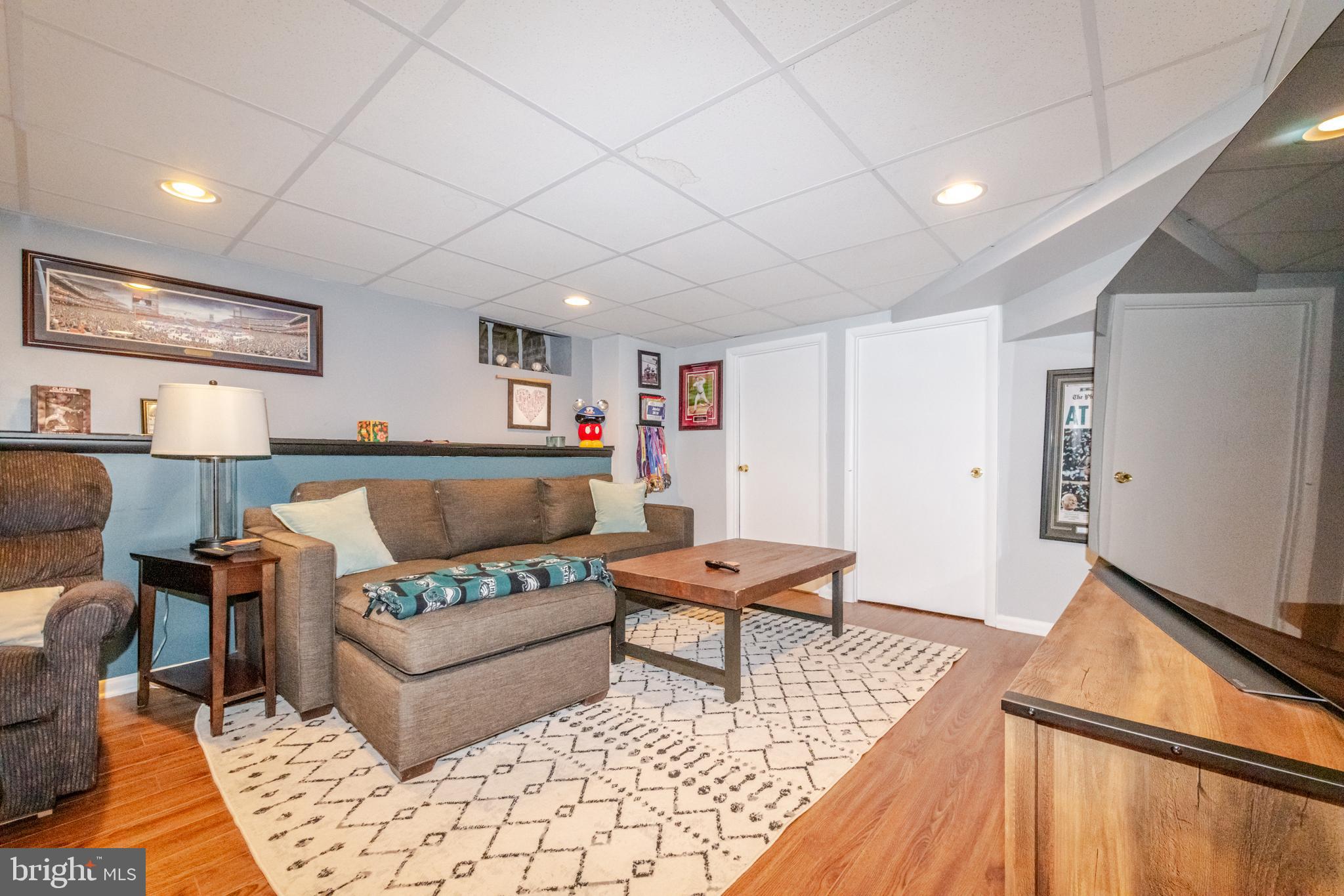 239 Hopkins Road Haddonfield, NJ 08033 - Photo 56 of 76 a living room with furniture and a wooden floor
