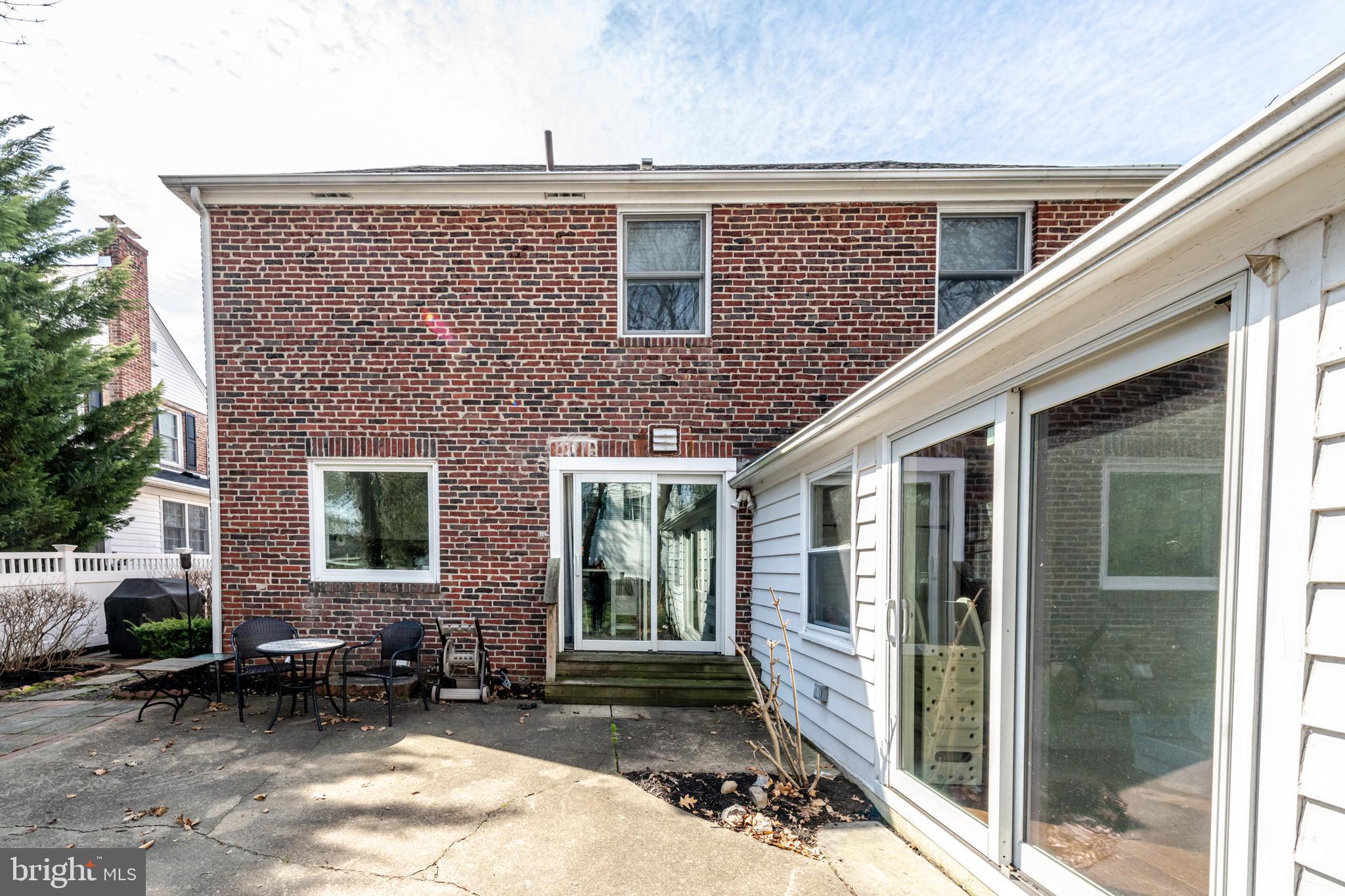 239 Hopkins Road Haddonfield, NJ 08033 - Photo 68 of 76 a front view of a house with a yard
