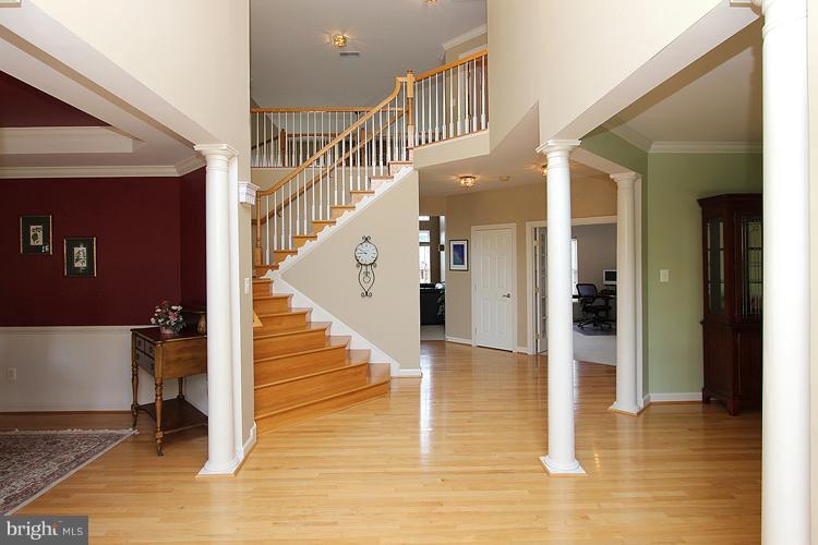 14422 Autumn Crest Road Boyds, MD 20841 - Photo 8 of 24 a view of entryway and hall with wooden floor