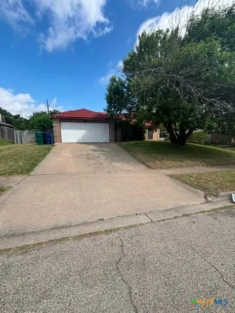 a view of outdoor space and yard