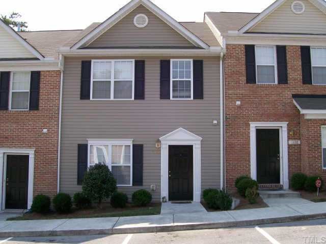 3404 Sosa Road Raleigh, NC 27610 - Photo 1 of 10 a front view of a house with yard and parking