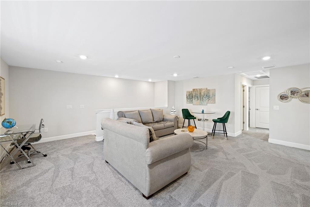 1973 Yellowfin Circle Naples, FL 34114 - Photo 16 of 44 a living room with furniture and a table