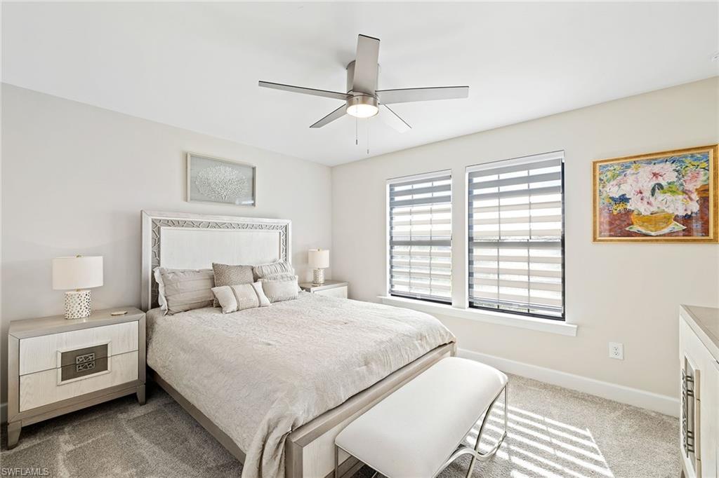 1973 Yellowfin Circle Naples, FL 34114 - Photo 33 of 44 a bedroom with a bed and a window