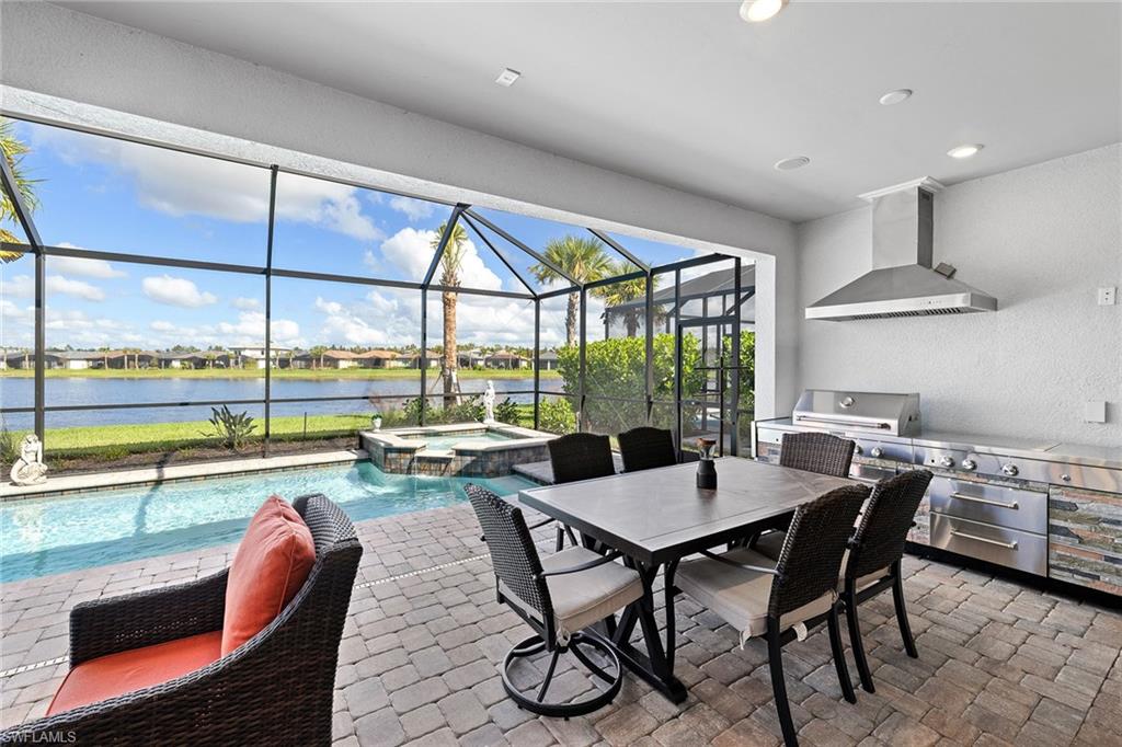 1973 Yellowfin Circle Naples, FL 34114 - Photo 38 of 44 a dining room with furniture a window and a table