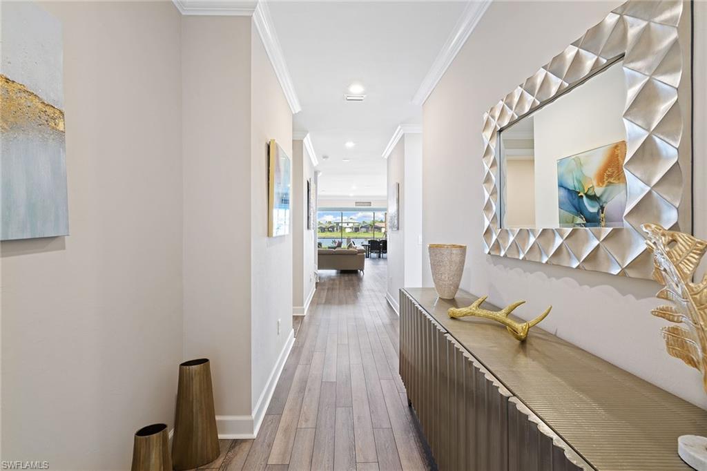 1973 Yellowfin Circle Naples, FL 34114 - Photo 6 of 44 a view of a living room and bathroom