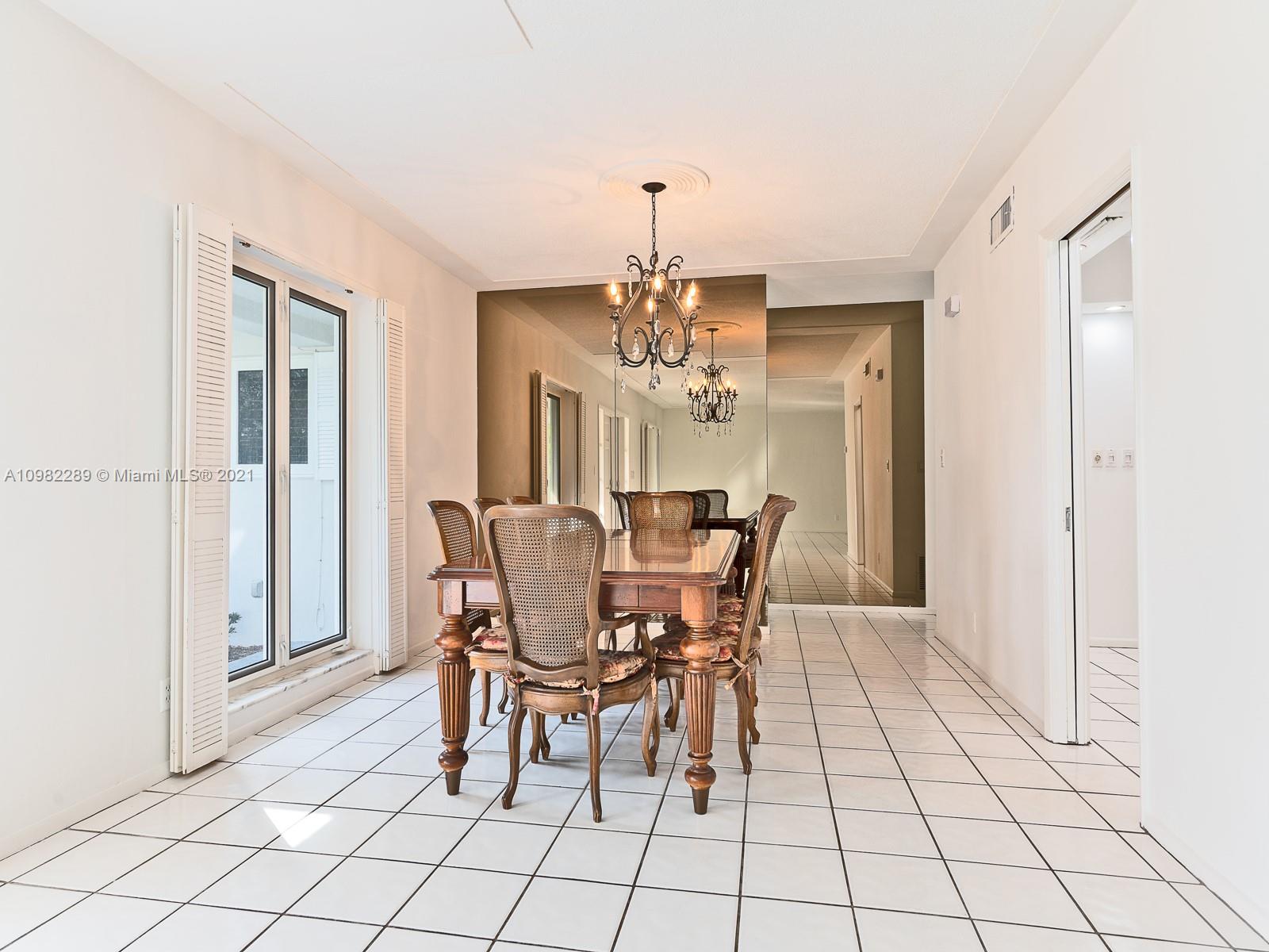 17 Minnetonka Road Sea Ranch Lakes, FL 33308 - Photo 11 of 39 Formal Dining.