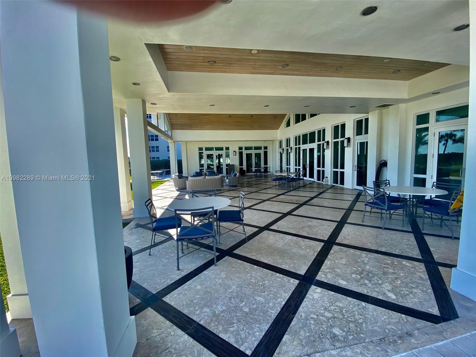 17 Minnetonka Road Sea Ranch Lakes, FL 33308 - Photo 38 of 39 Clubhouse patio.
