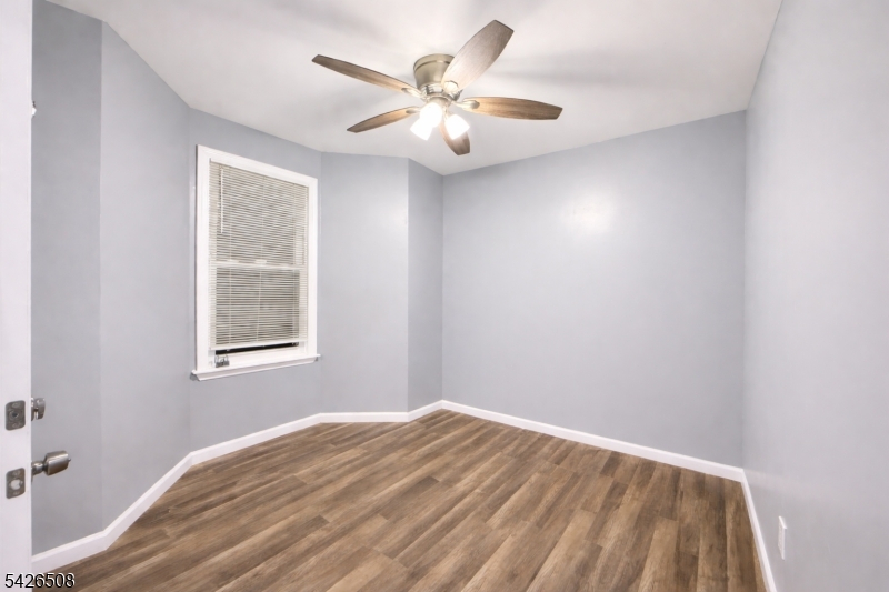 411 South 16th Street, Unit 1 Newark, NJ 07103 - Photo 2 of 39 a view of an empty room with a window