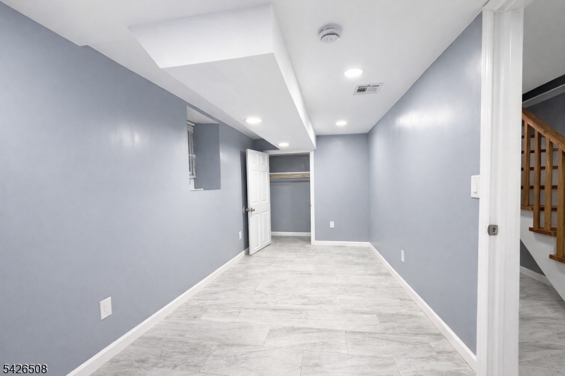 411 South 16th Street, Unit 1 Newark, NJ 07103 - Photo 30 of 39 a view of hallway with a large window