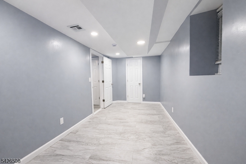 411 South 16th Street, Unit 1 Newark, NJ 07103 - Photo 32 of 39 a view of an empty room